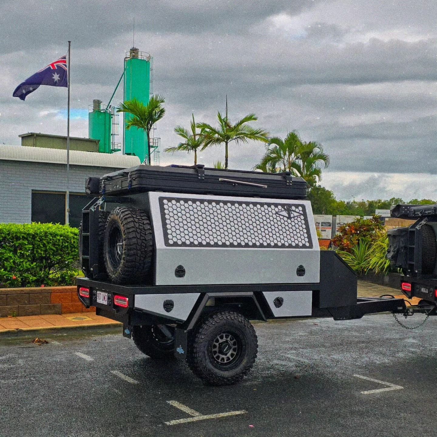 Gray and Black Off-Road Camping Trailer Parked on Asphalt — Mingweld Fabrication in Bungalow, QLD