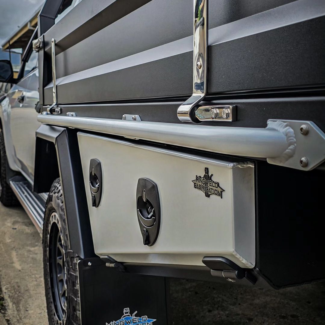A Close up Of a Metal Item with Business Logo on It — Mingweld Fabrication in Bungalow, QLD