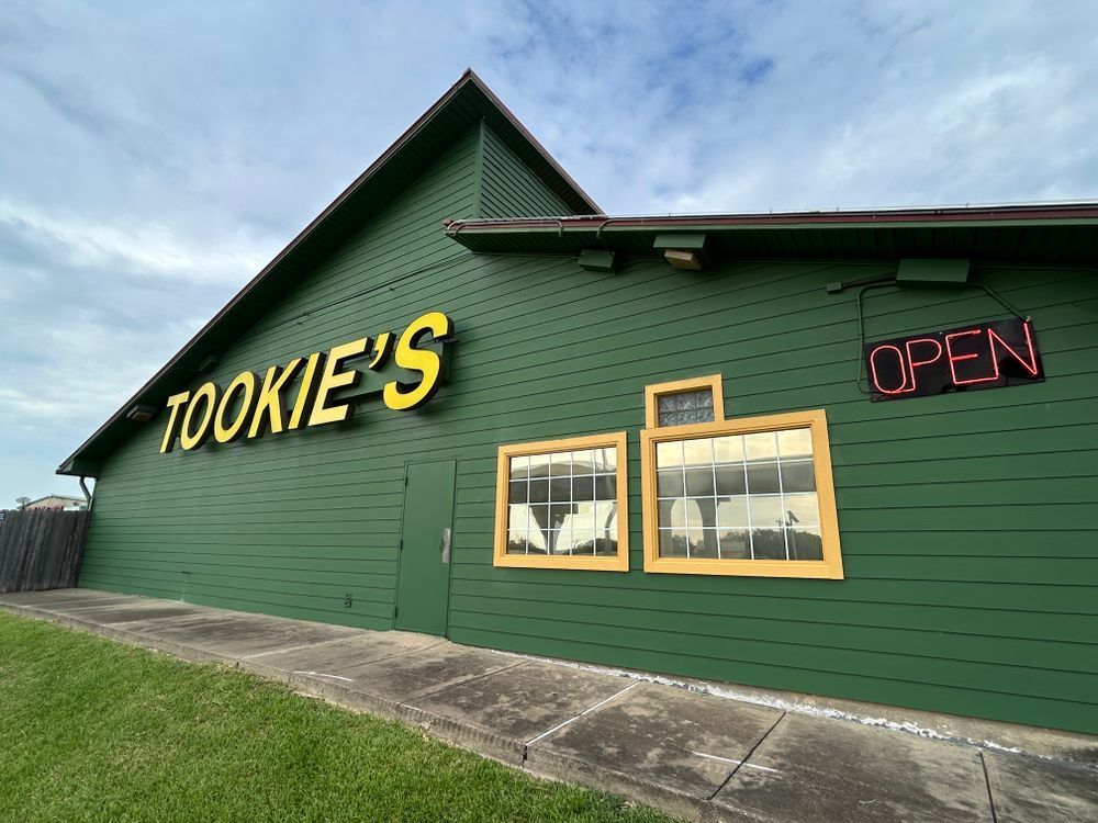 Green building with yellow 