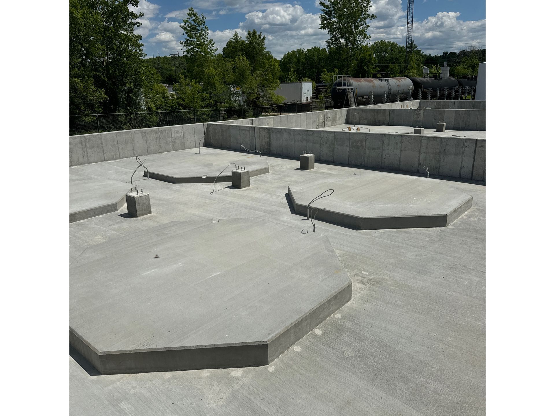 A concrete floor with a lot of holes in it