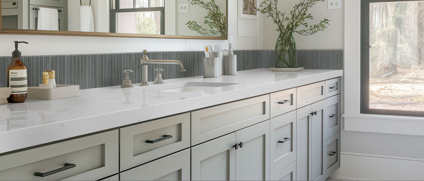White marble sink with tiered basin, mountain-shaped backsplash. White marble sink with tiered basin, mountain-shaped backsplash.
