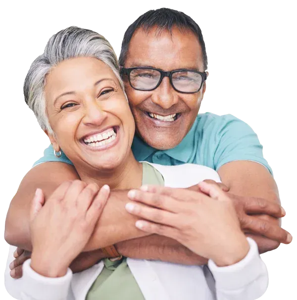 Husband and wife smiling together, representing Edge Roofing’s referral program and why we reward customer referrals.