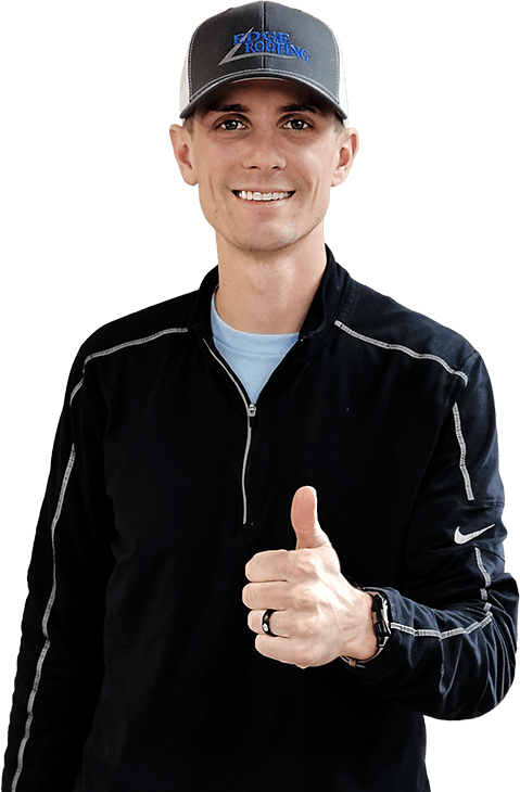 Final roof walkthrough complete – another Edge Roofing install done right. Edge Roofing team member wearing an Edge Roofing hat giving a thumbs up after a completed roof installation, representing final walkthrough and customer satisfaction.