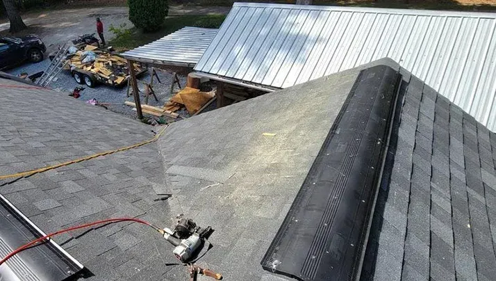 Roof Warranties Explained Roof warranty document and roofing materials shown for a Georgia section explaining manufacturer and workmanship warranties.