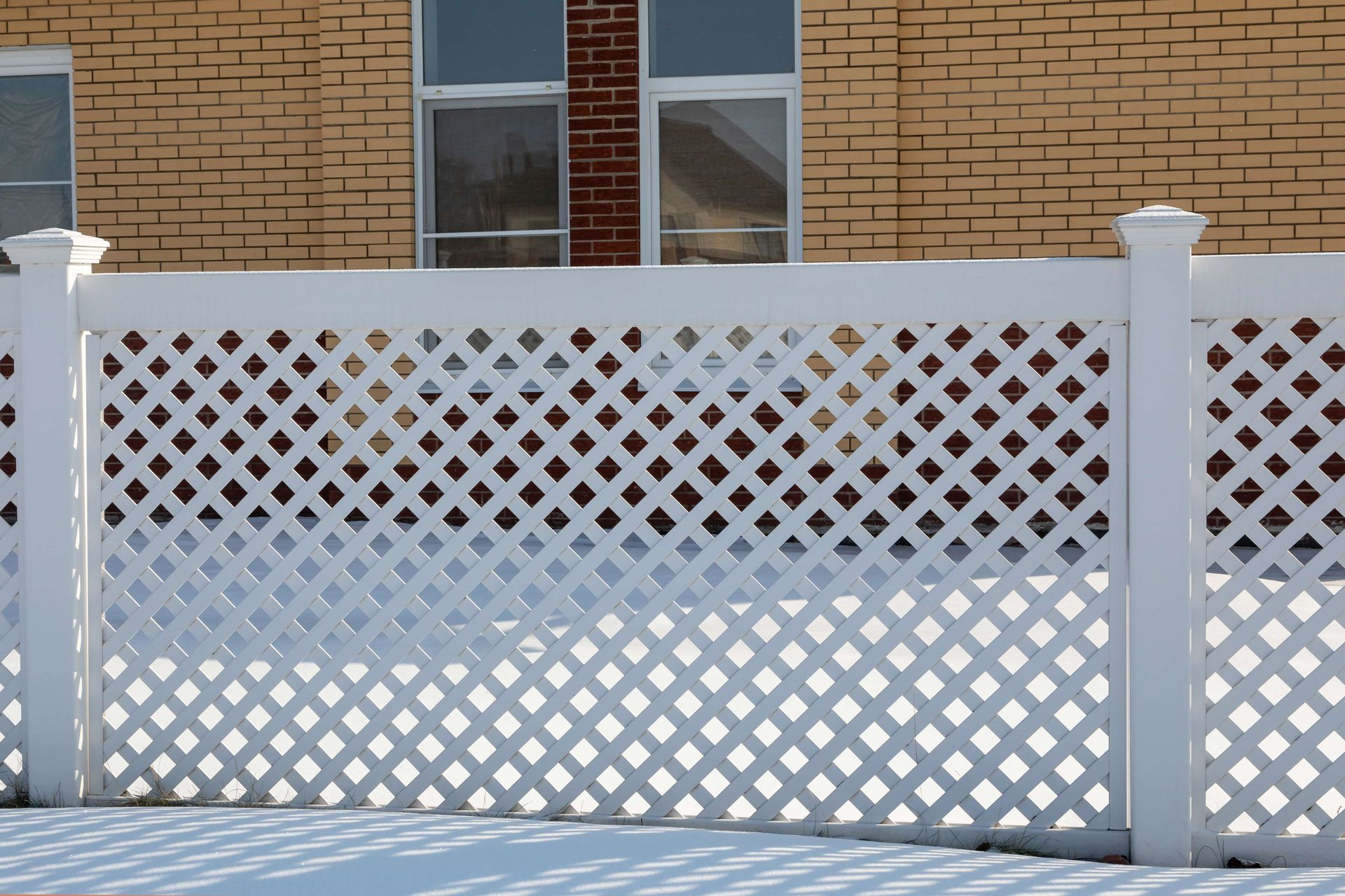 Modern vinyl fence with patterns