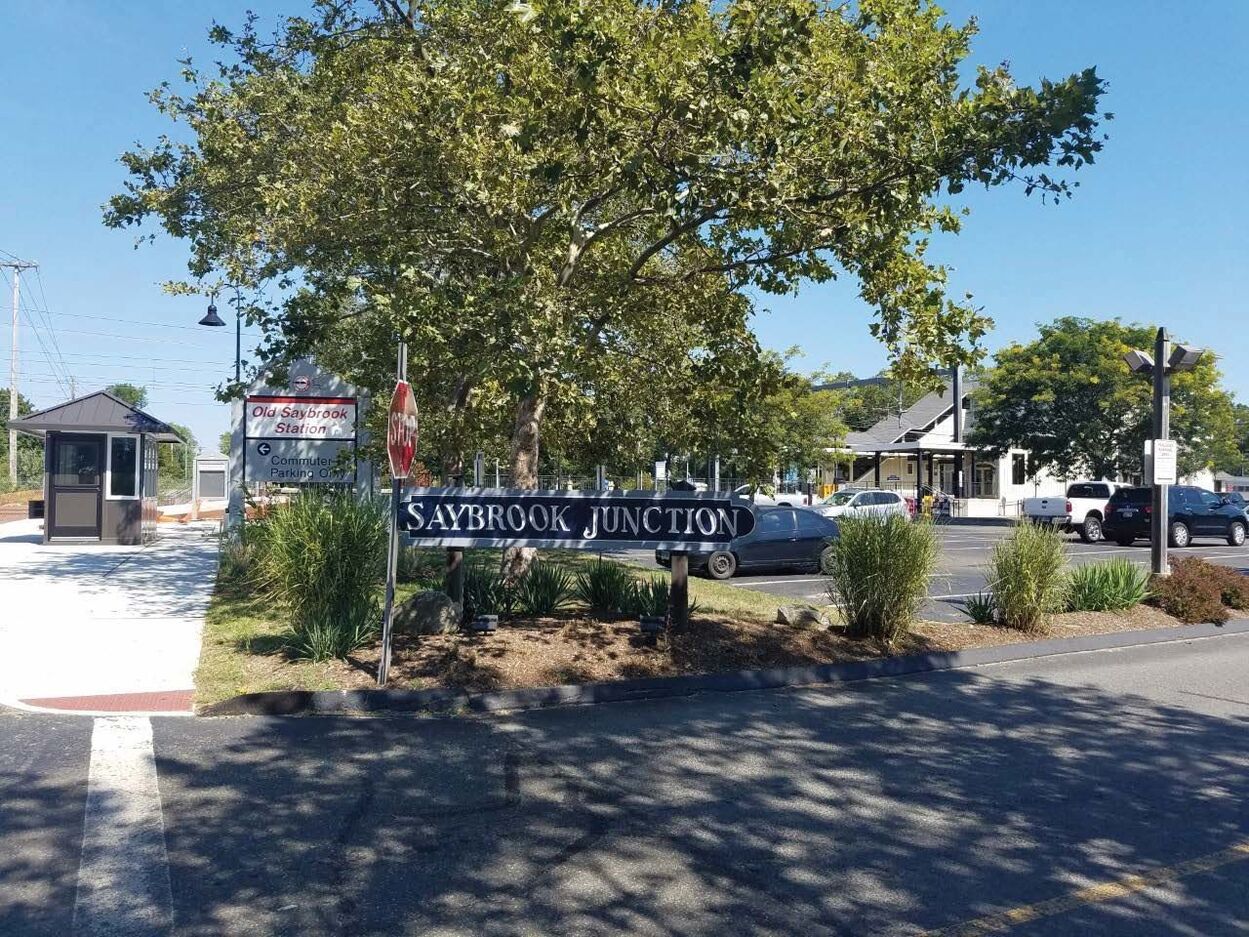 A parking lot with a sign that says saybrook junction