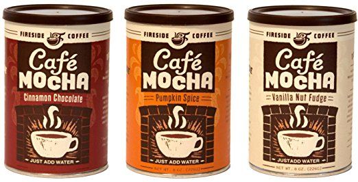Three cans of cafe mocha coffee in different flavors.