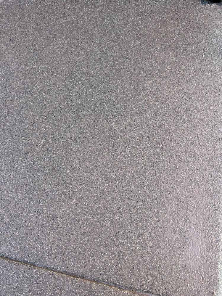 Gray asphalt pavement.