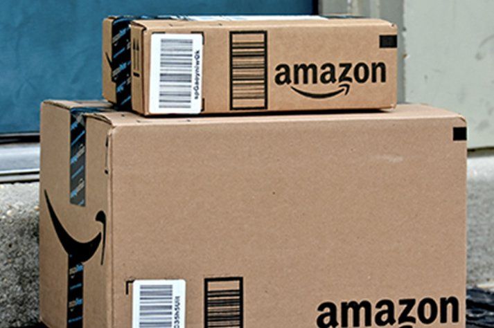 Two amazon boxes are stacked on top of each other