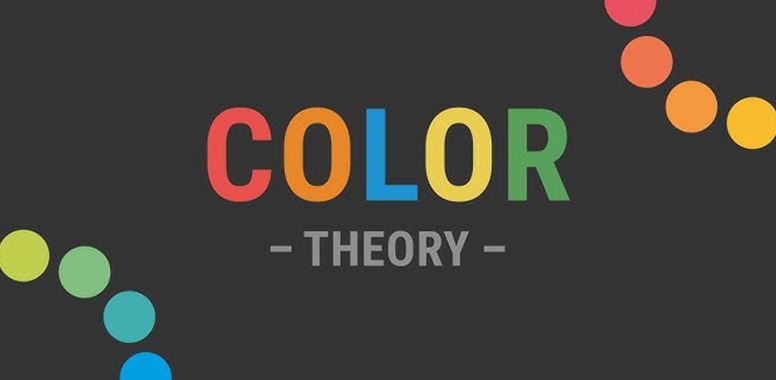 A black background with rainbow colored circles and the words color theory