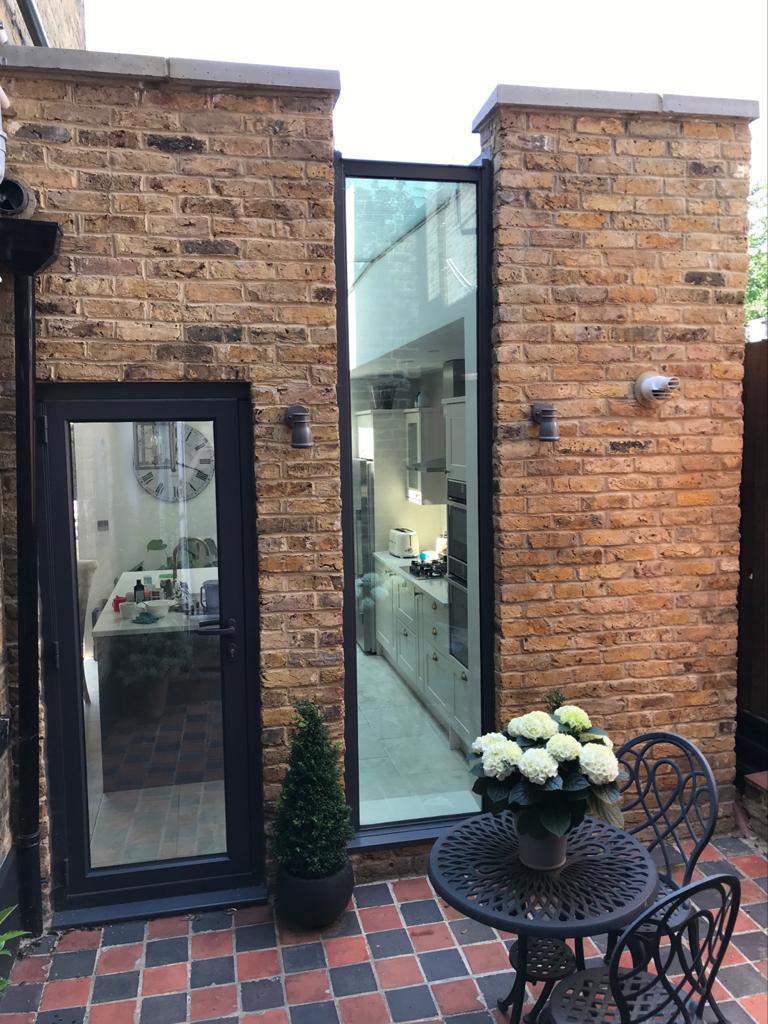 Esdon Architecture. Wiltshire and Hampshire Architect. Rear extension South West London, Structural Glazing. Courtyard. Planning application and planning permission. 