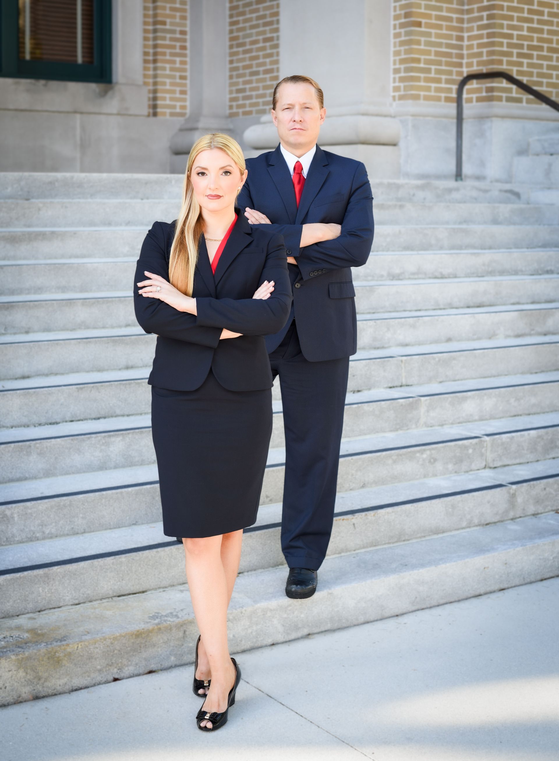 Attorneys can explain Chapter 13 repayment options to a client at Lynn Law Group office 