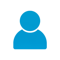 A man with a beard is smiling and wearing a black sweater.