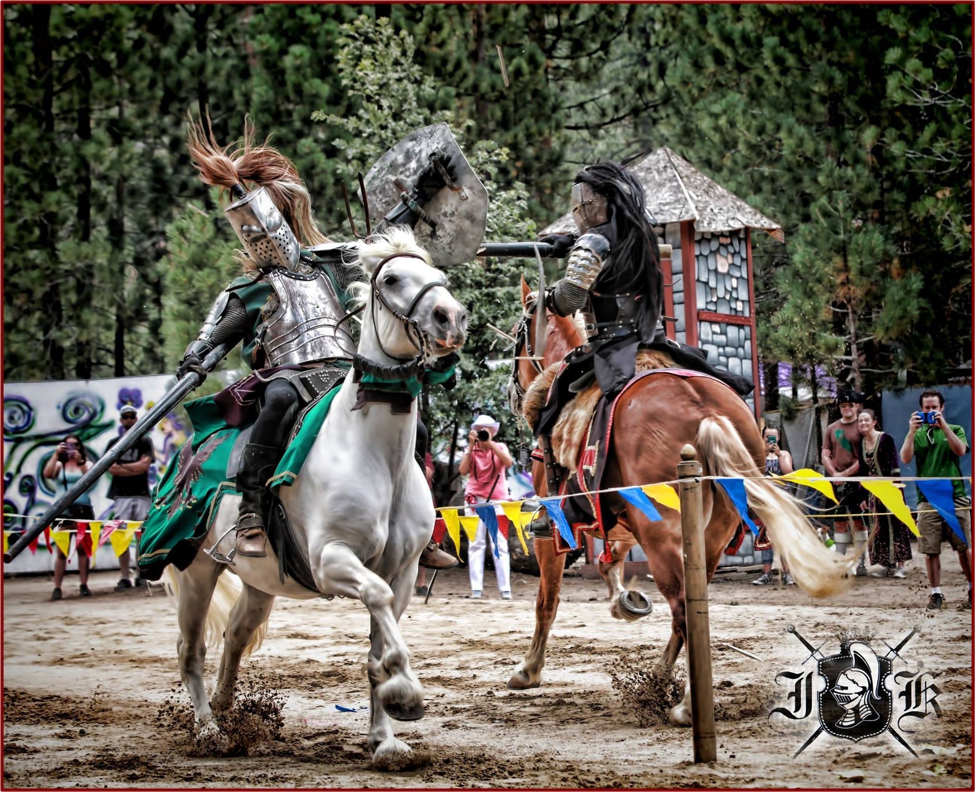 A man is riding a horse jousting while another man is riding a horse.