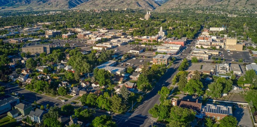 An Aerial View Of A City With Mountains In The Background — East Coast Metal Recycling In Logan, QLD