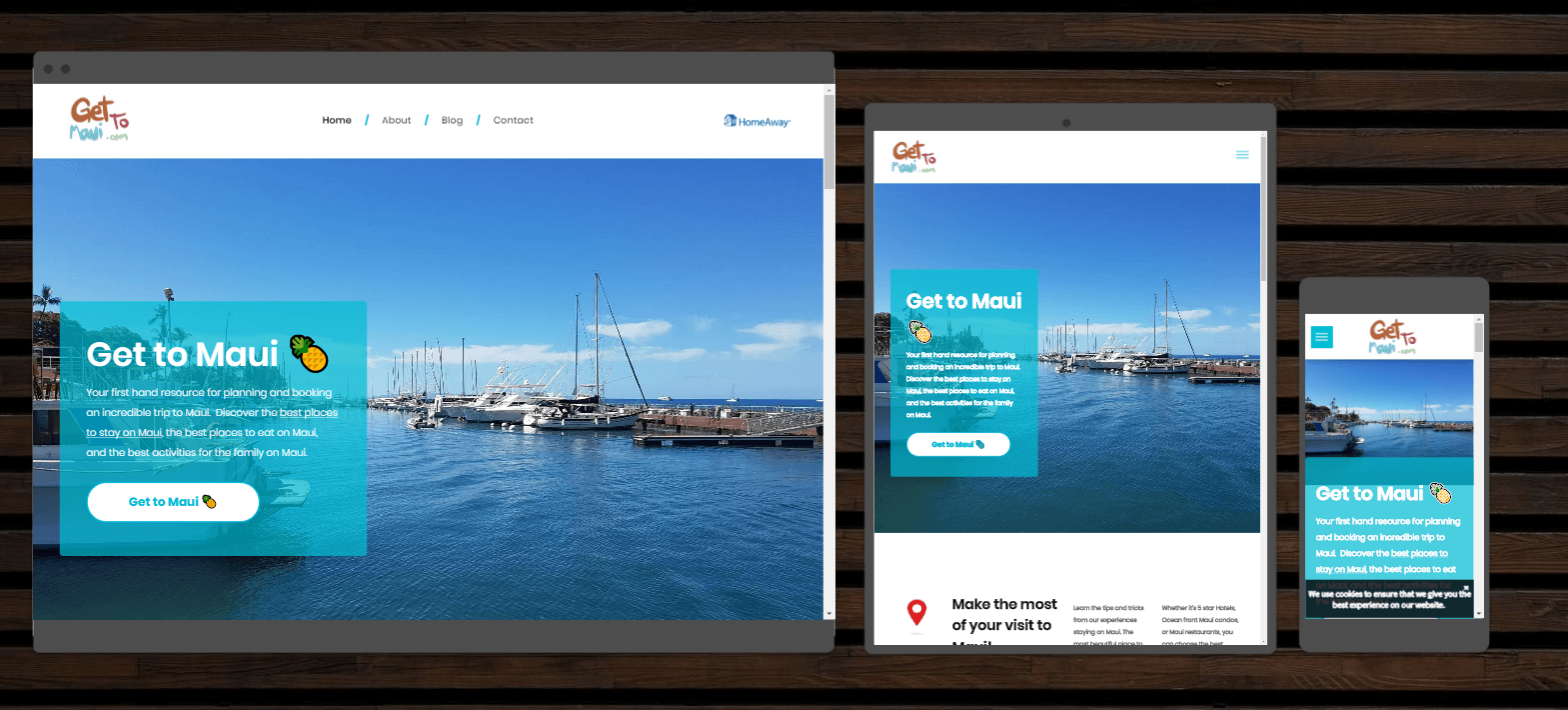 A website is displayed on a computer tablet and phone