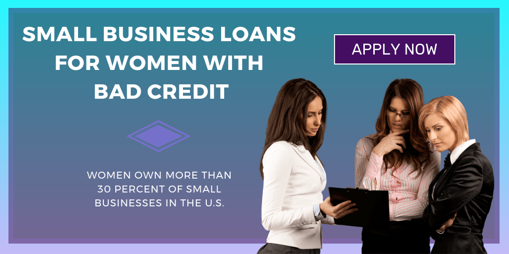 Three women are standing next to each other looking at a laptop.