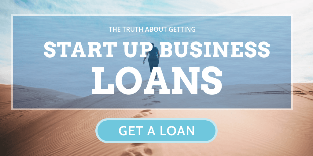 A person is walking through a desert with the words `` start up business loans '' written on it.