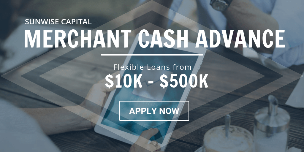 A person is using a tablet with the words merchant cash advance on it.