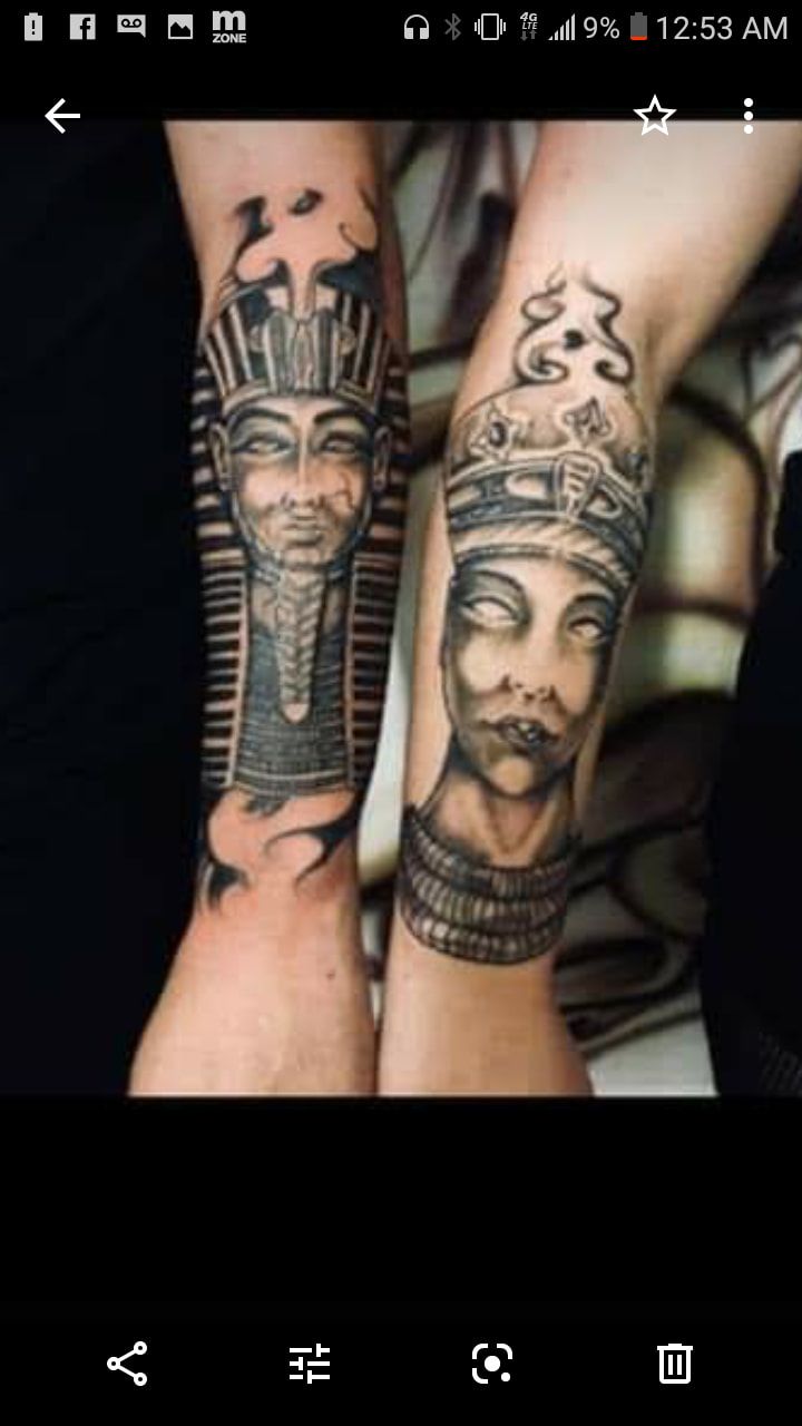 A person has a tattoo of a king and queen on their arms