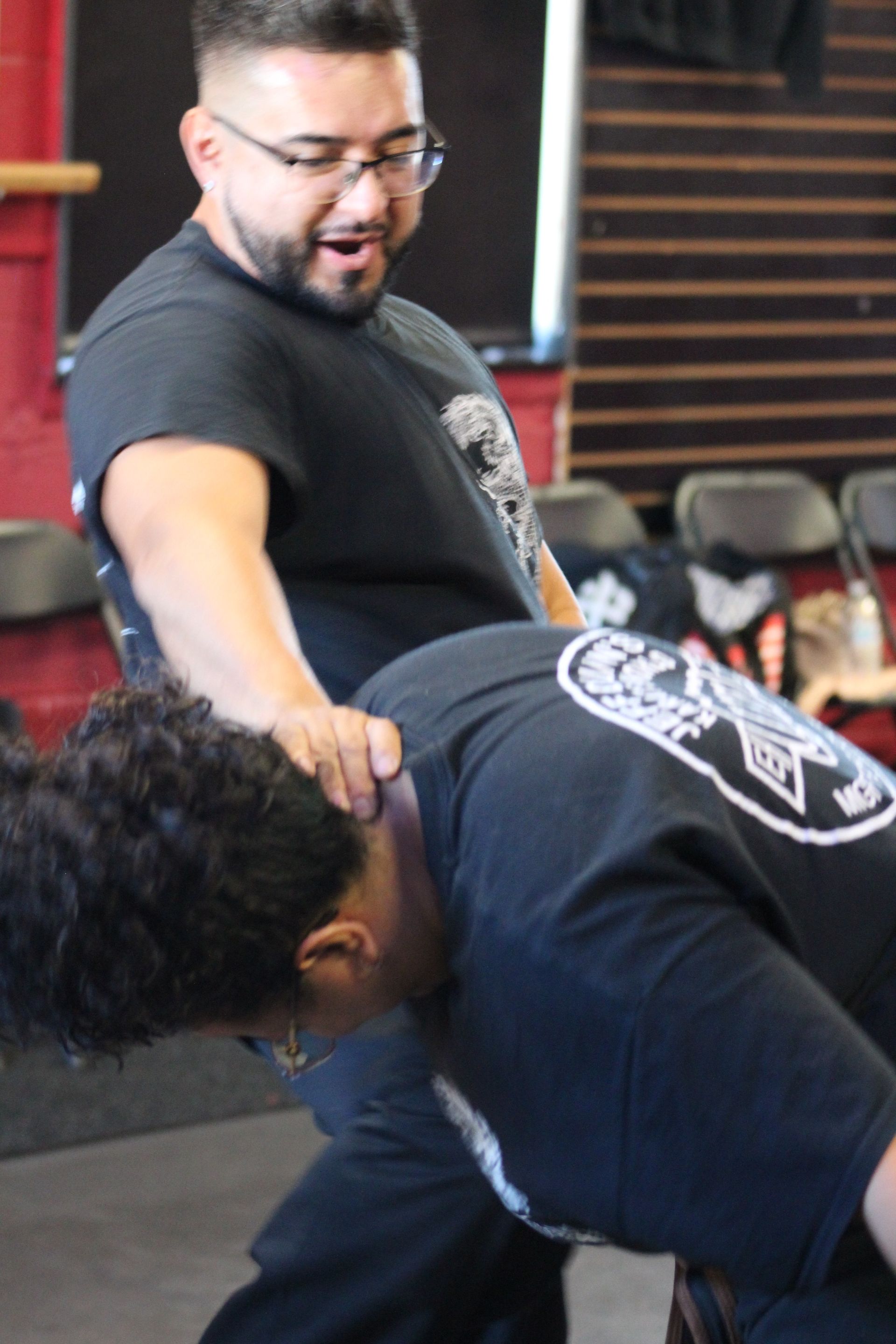 Adults practicing karate combinations at Karate World in Kenilworth, NJ, building confidence, balance, and focus.