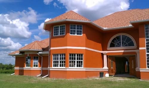 Front of Orange House - Gutter Service in Port Charlotte, FL