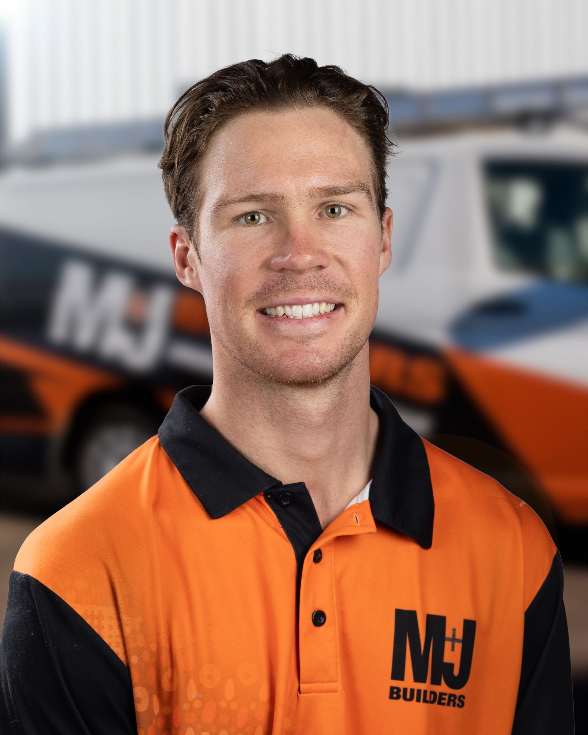 Silhouette of a person against a gray background. Shows head, shoulders, and upper chest.