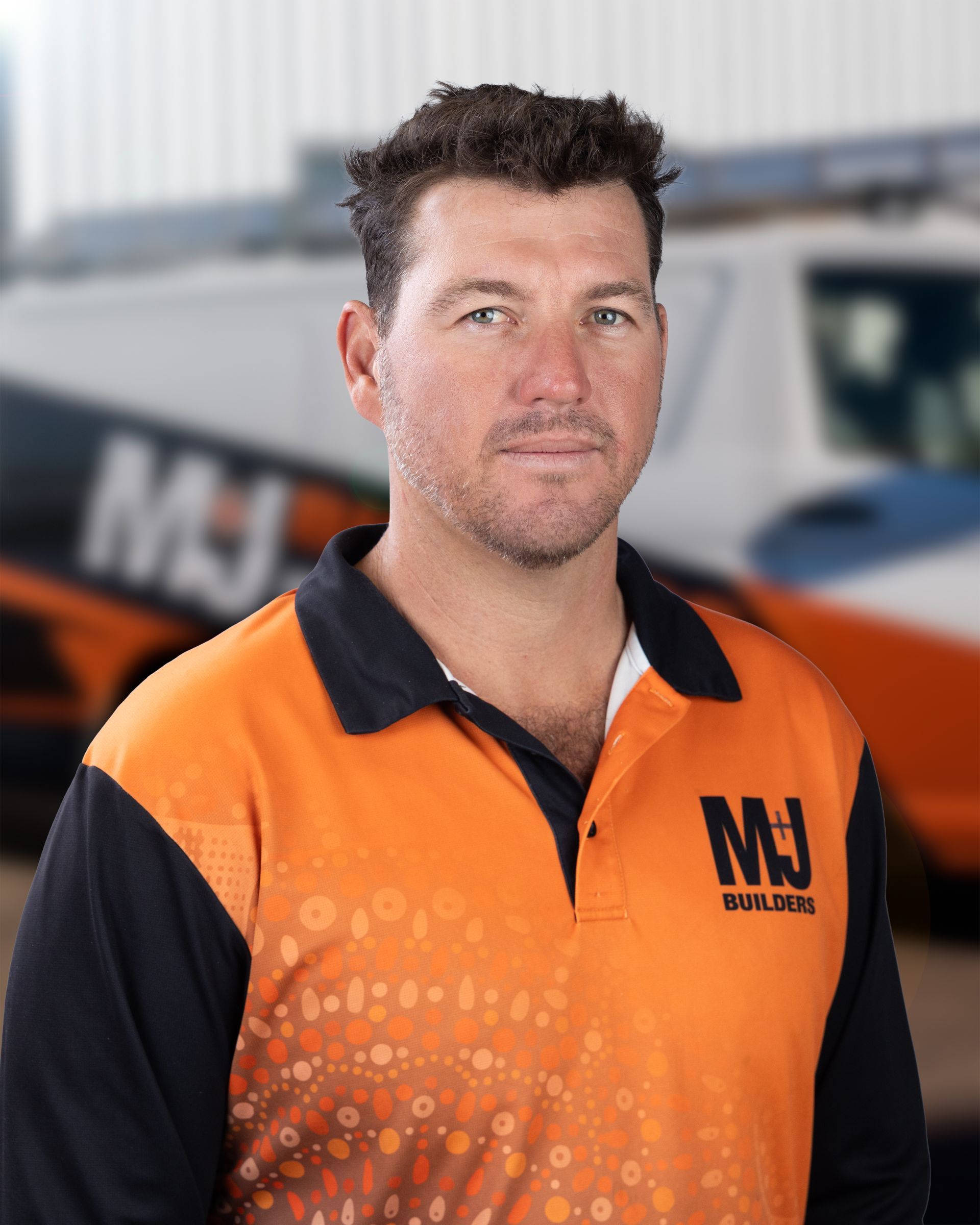 Man in orange and black