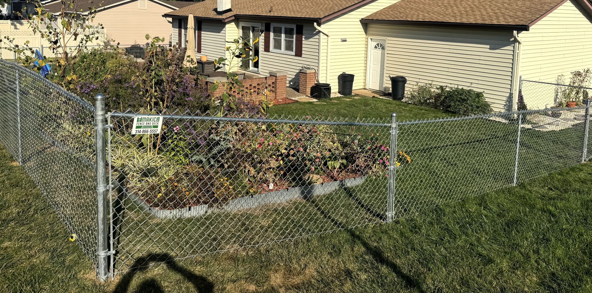 Chain link fencing with gate installation in Oakville, MO