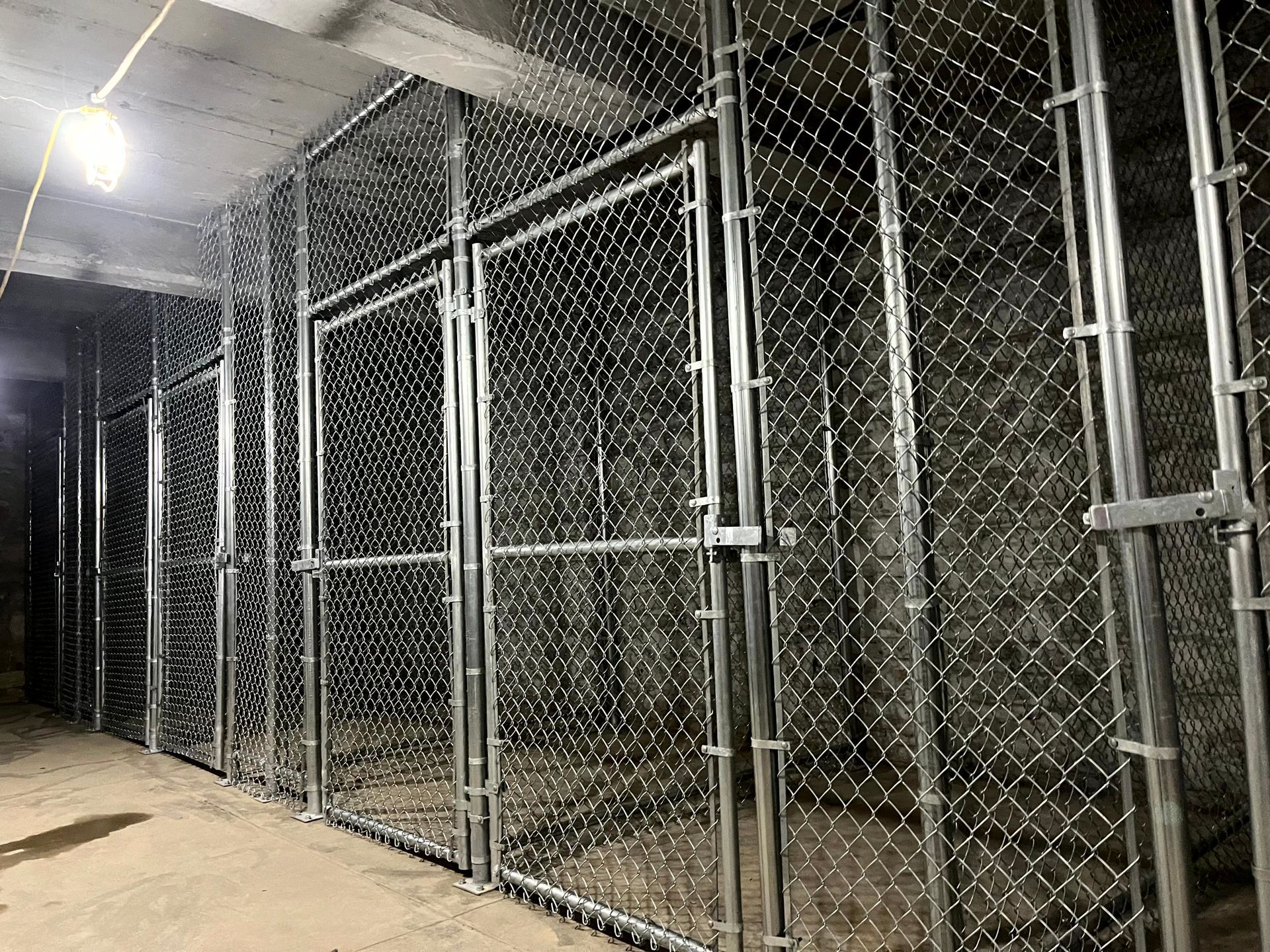 Commercial chain link security cages for indoor storage areas