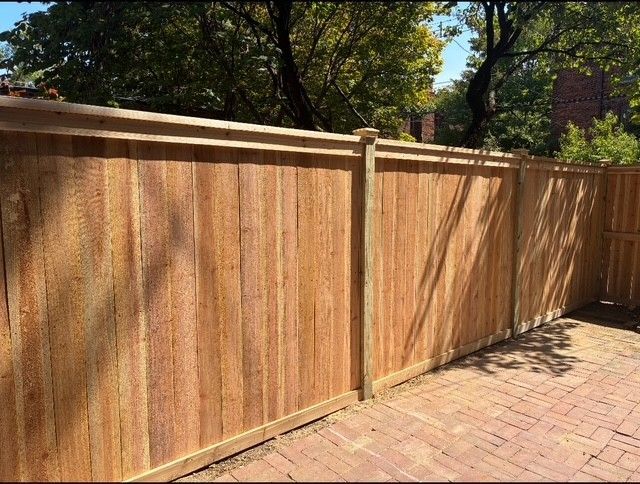 Local fence company installing privacy fence in St. Louis, Missouri.