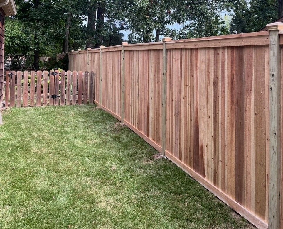 Custom wood privacy fencing installation by Makic Fence and Deck in Oakville, Missouri