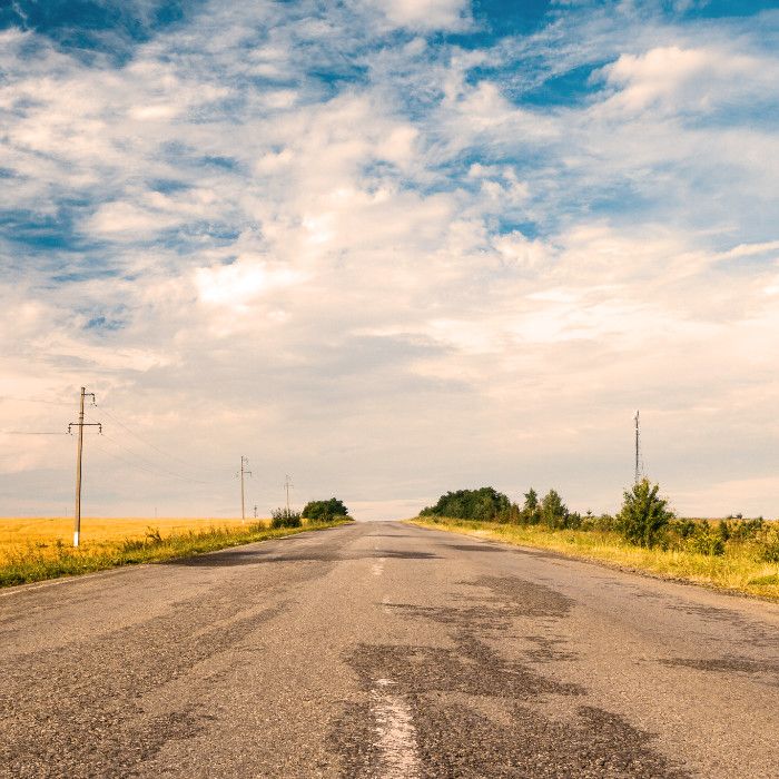 Empty county highway in a rural setting