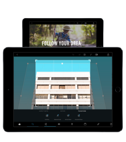 A tablet showcasing the Photoshop Express software in action, with a picture of a building displayed on it.