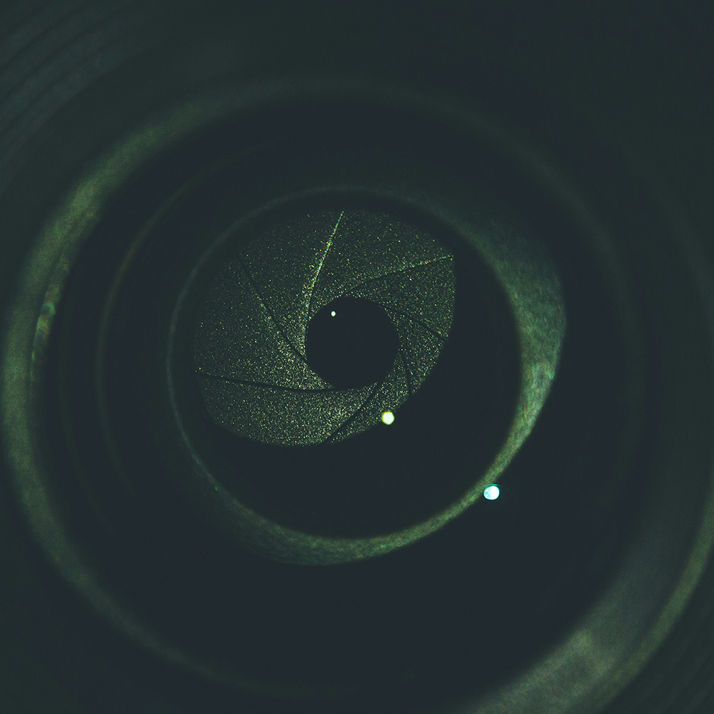 A close up of the inside of a camera lens.