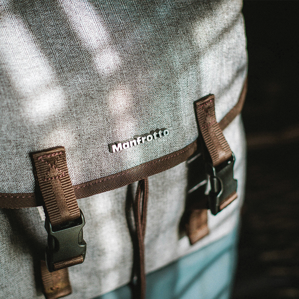 A grey and brown manfrotto bag is shown in closeup
