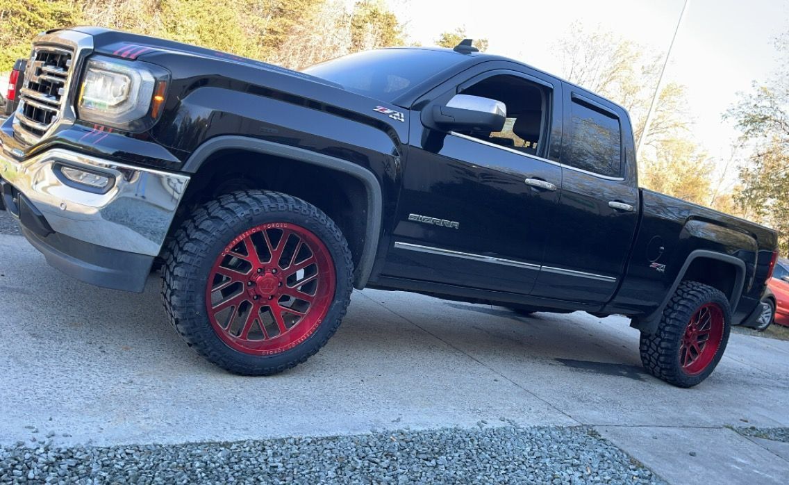 Lifted Car — Reidsville, NC — Tire Kountry