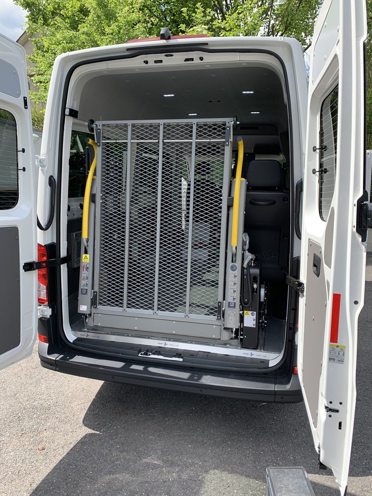 Garage ETPL SA transformation transport de personnes à mobilité réduite avec pont plié