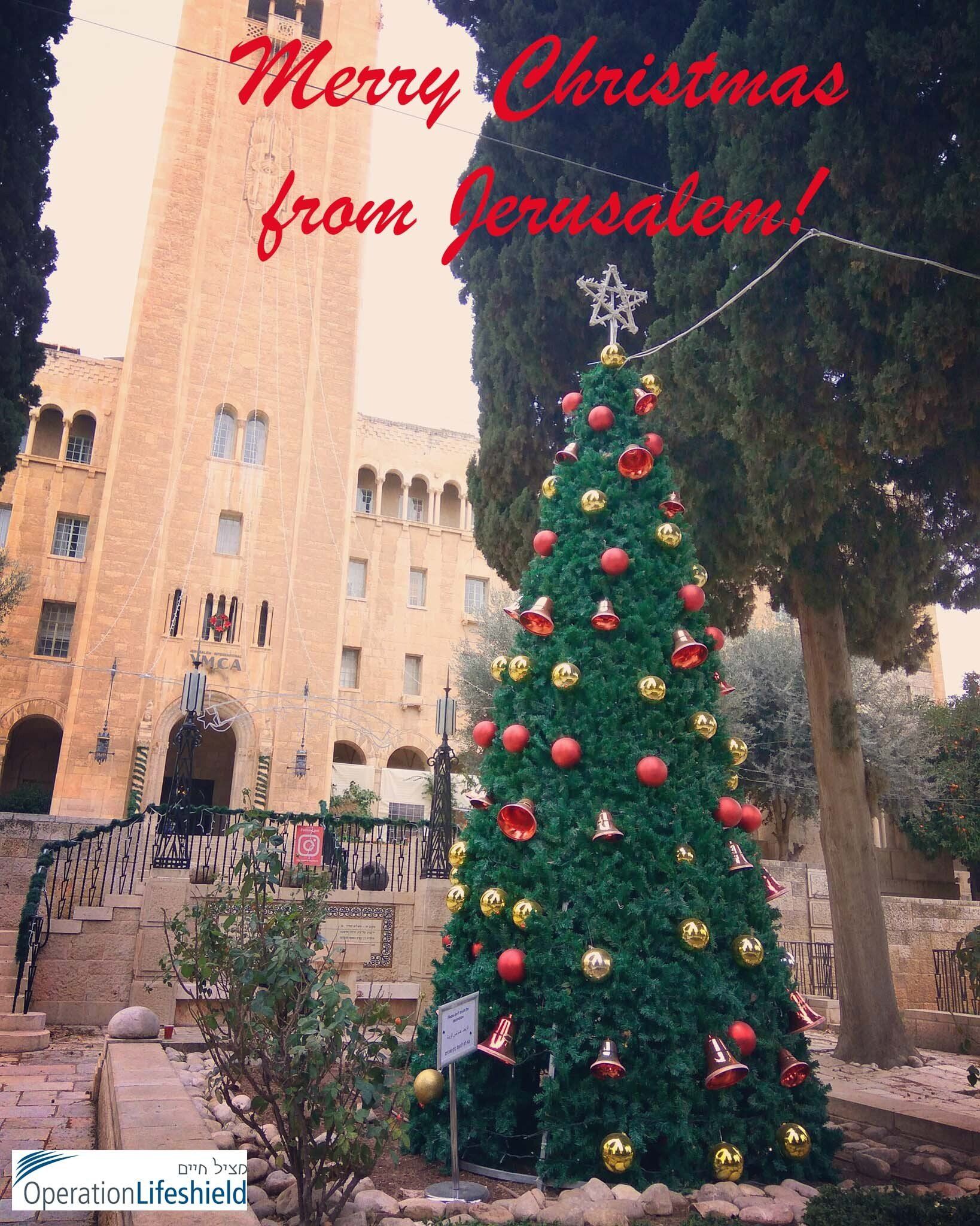 A picture of a christmas tree with the words merry christmas from jerusalem