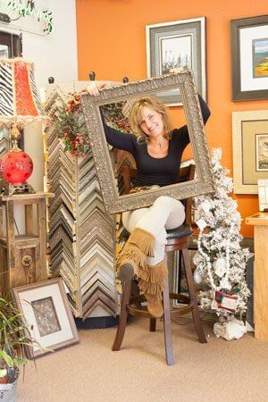 Woman and Frame — picture framing in Conifer,, CO