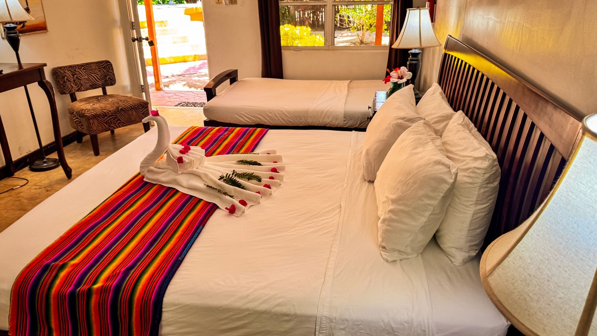 Comfortable King bedroom with modern Belizean design at Caribbean Shores B&B