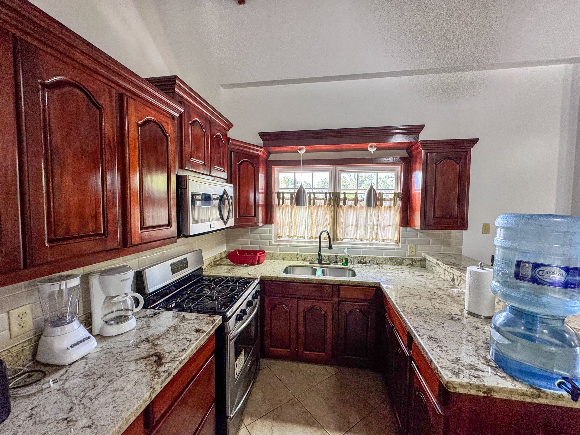 fully equipped kitchen at the studio apartment in Hopkins Village, Belize 