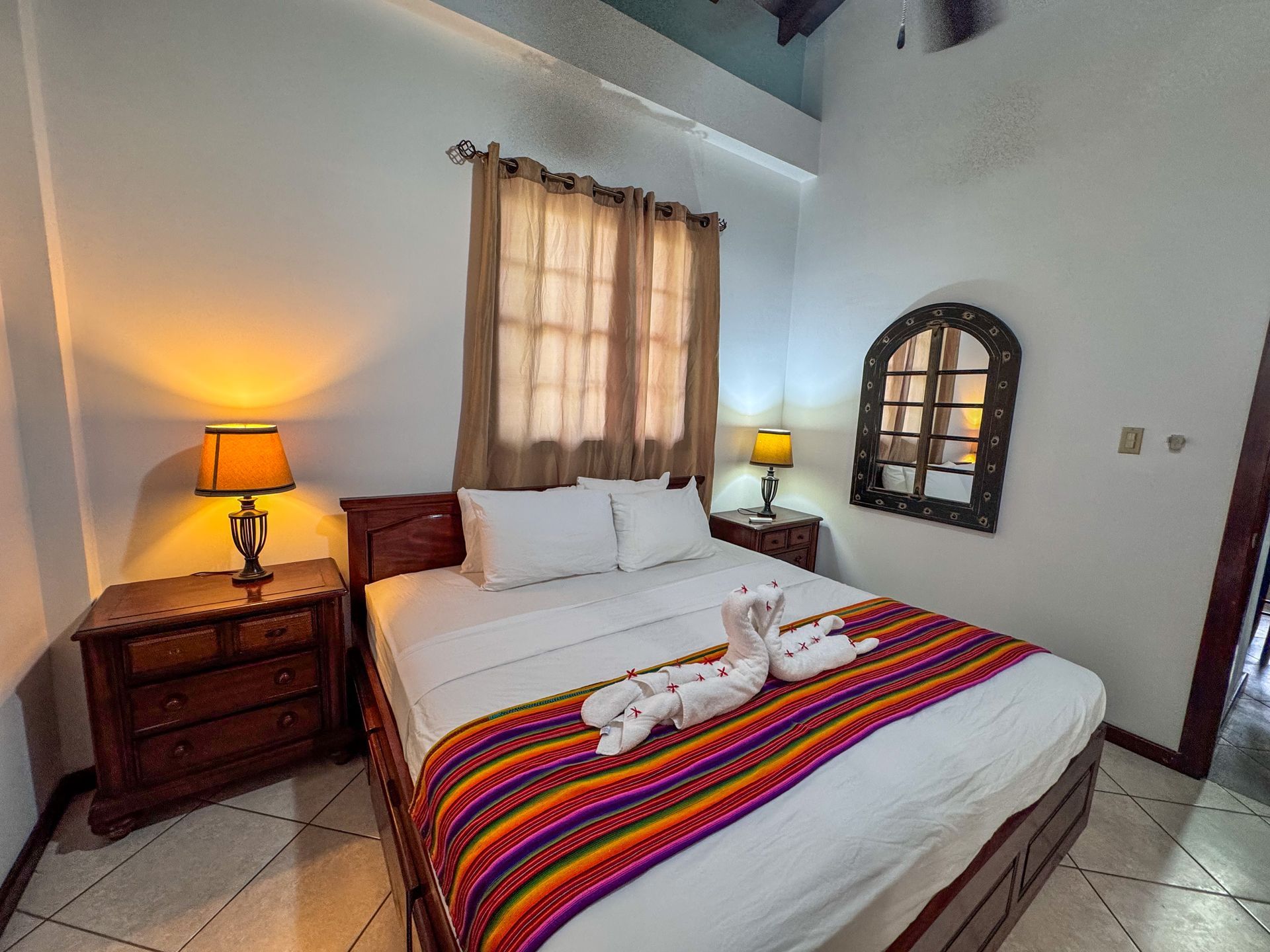 Master Bedroom with a king bed at Caribbean Shores B&B 