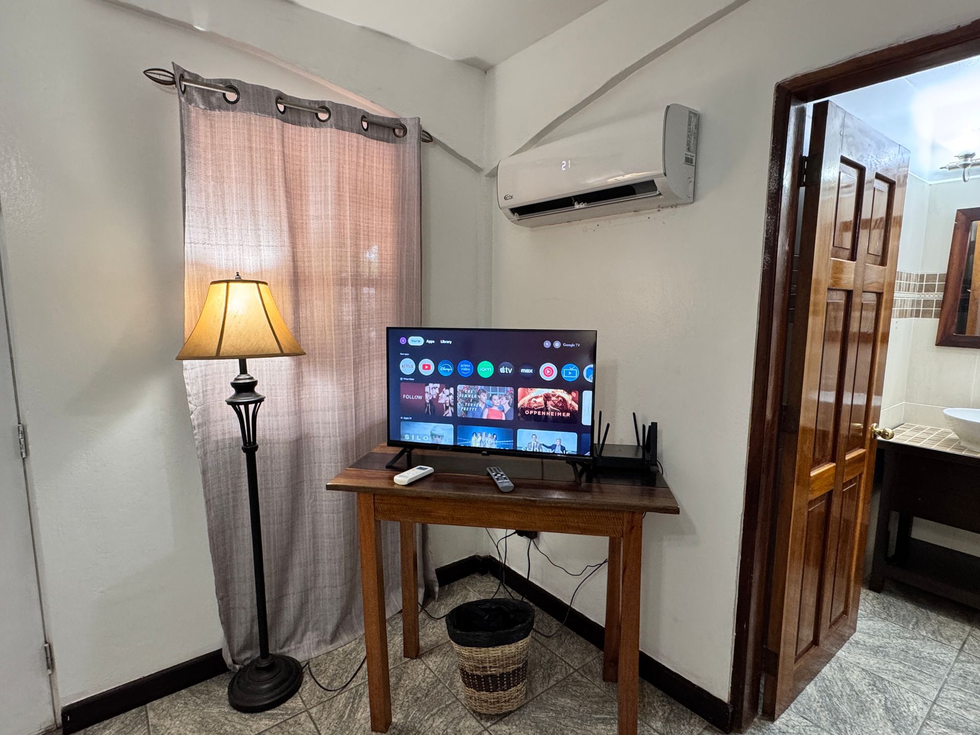 smart tv and air-conditioned room at Caribbean Shores B&B, Hopkins Village Belize 