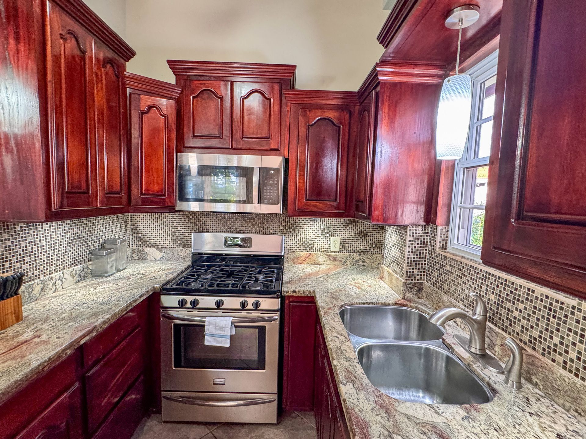 Modern kitchen in two-bedroom apartment at Hopkins Village with appliances and counter space