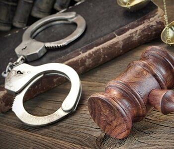 Law — Hancuffs and Gavel in Houston, TX