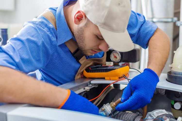 plumber fixing leaking