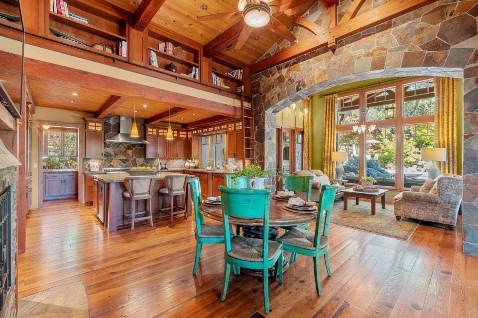 A wood ceiling also tops the center-island kitchen.