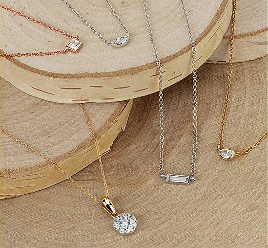 Close-up of several delicate necklaces 