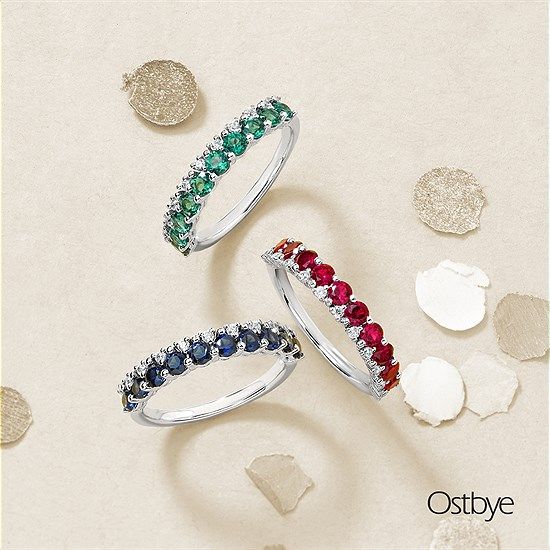 Three gemstone rings: emerald, ruby, and sapphire